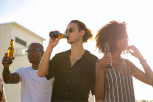 Group drinking beet outdoors
