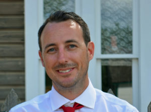 Headshot of Travis Baker